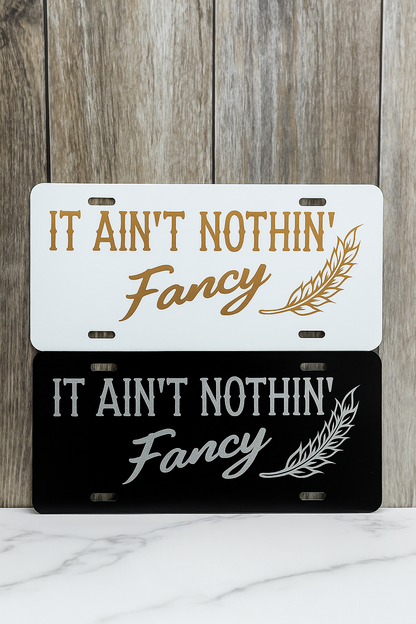 It Ain't Nothin' Fancy License Plate